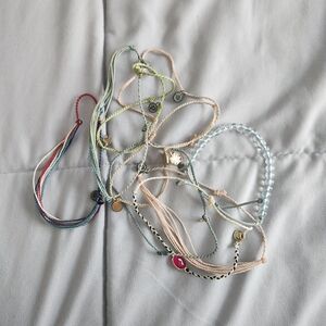 Eight Pura Vida Bracelets and one 4 Ocean bracelet